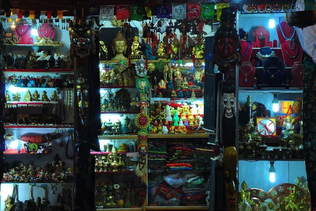 Various pieces are displayed in the curio shop of DARJEELING.